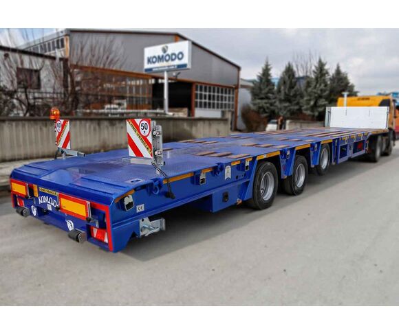 KMD 3 AXLE EXTENDABLE PLATFORM SEMI - TRAILER